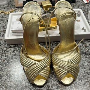 Gold Gucci heels